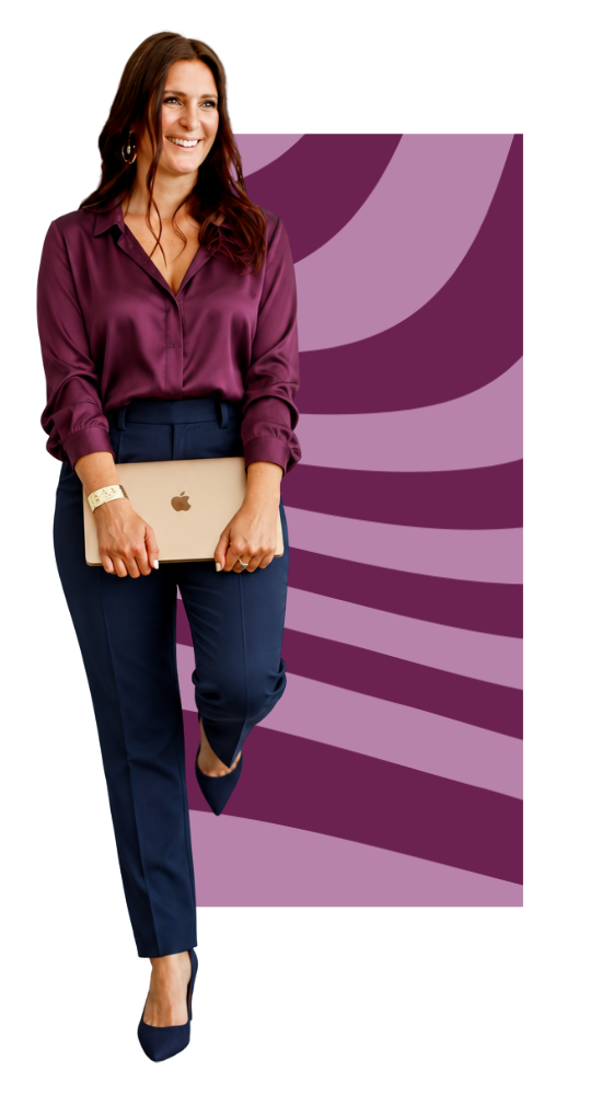 Jeanette Craig in a plum silk blouse and navy trousers, holding a laptop, standing in front of an editorial plum and lilac wave-pattern background